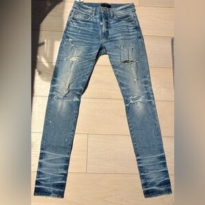 AMIRI Light Blue Distressed Skinny Jeans